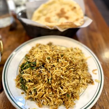 Curry Leaf signature dishes Chicken Tikka MasalaChicken BiryaniPalak Paneer